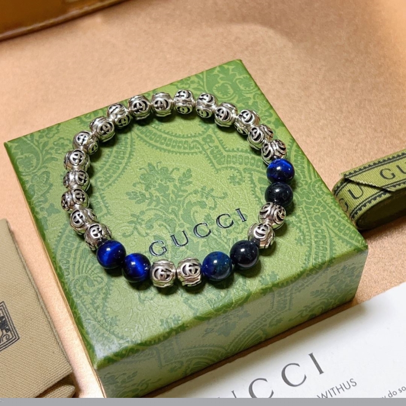 G*u*i bracelets